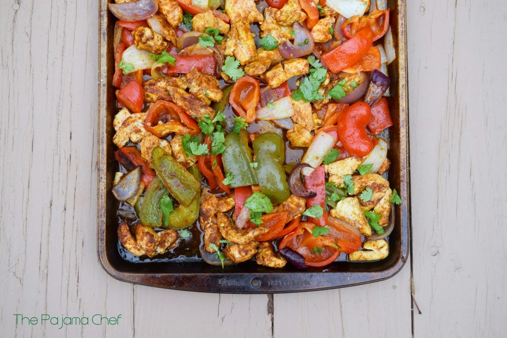 Simple sheet pan chicken fajitas - I think you are going to want these in your mouth, like, last night for dinner. They bake ALL BY THEMSELVES in the oven but still have a bit of that smoky flair you love. A great weeknight dinner that the whole family will enjoy!