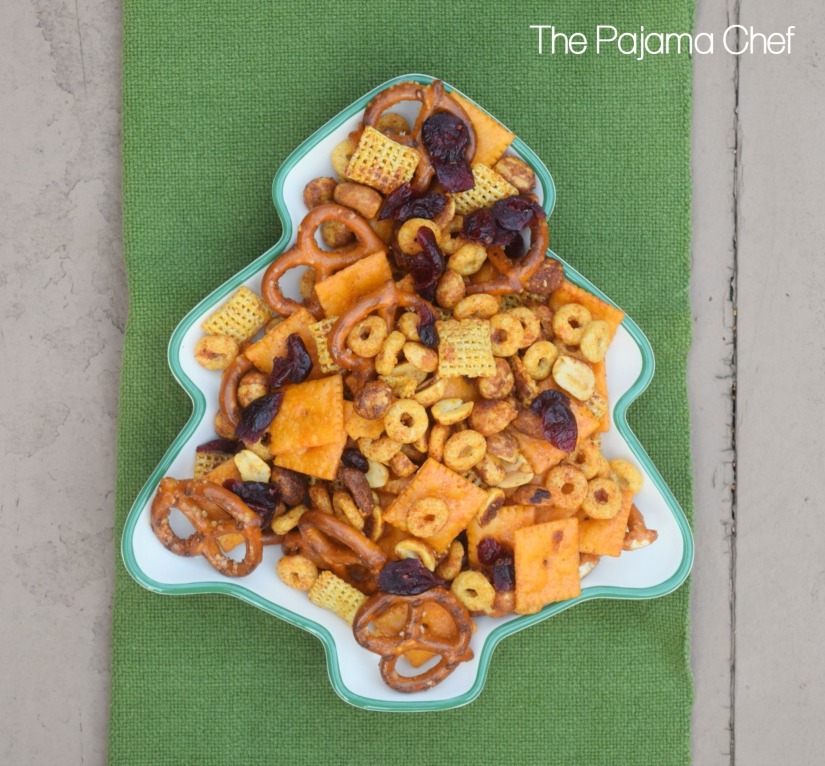 Sweet and spicy snack mix--a delightful blend of pretzels, honey roasted peanuts, cheese crackers, cereal, and dried cranberries. Everyone will love this addictive snack!